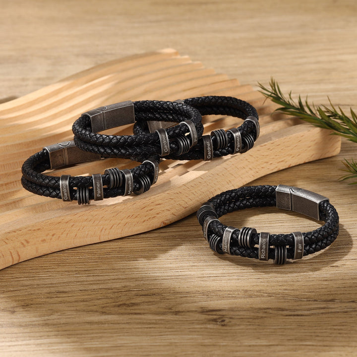 Personalized Black Braided Leather Bracelet with Dark Grey Stainless Steel Rings with 5 engravings - Herzschmuck